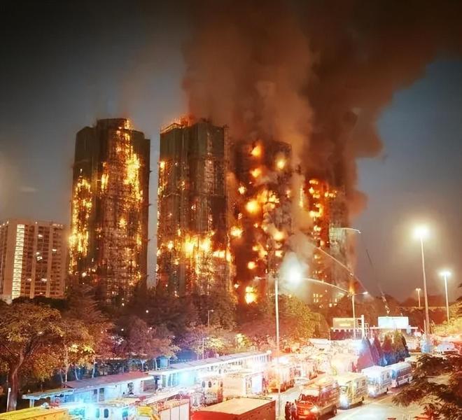 八栋高楼一夜焚毁有人说香港用竹脚手架是非遗落后就是落后